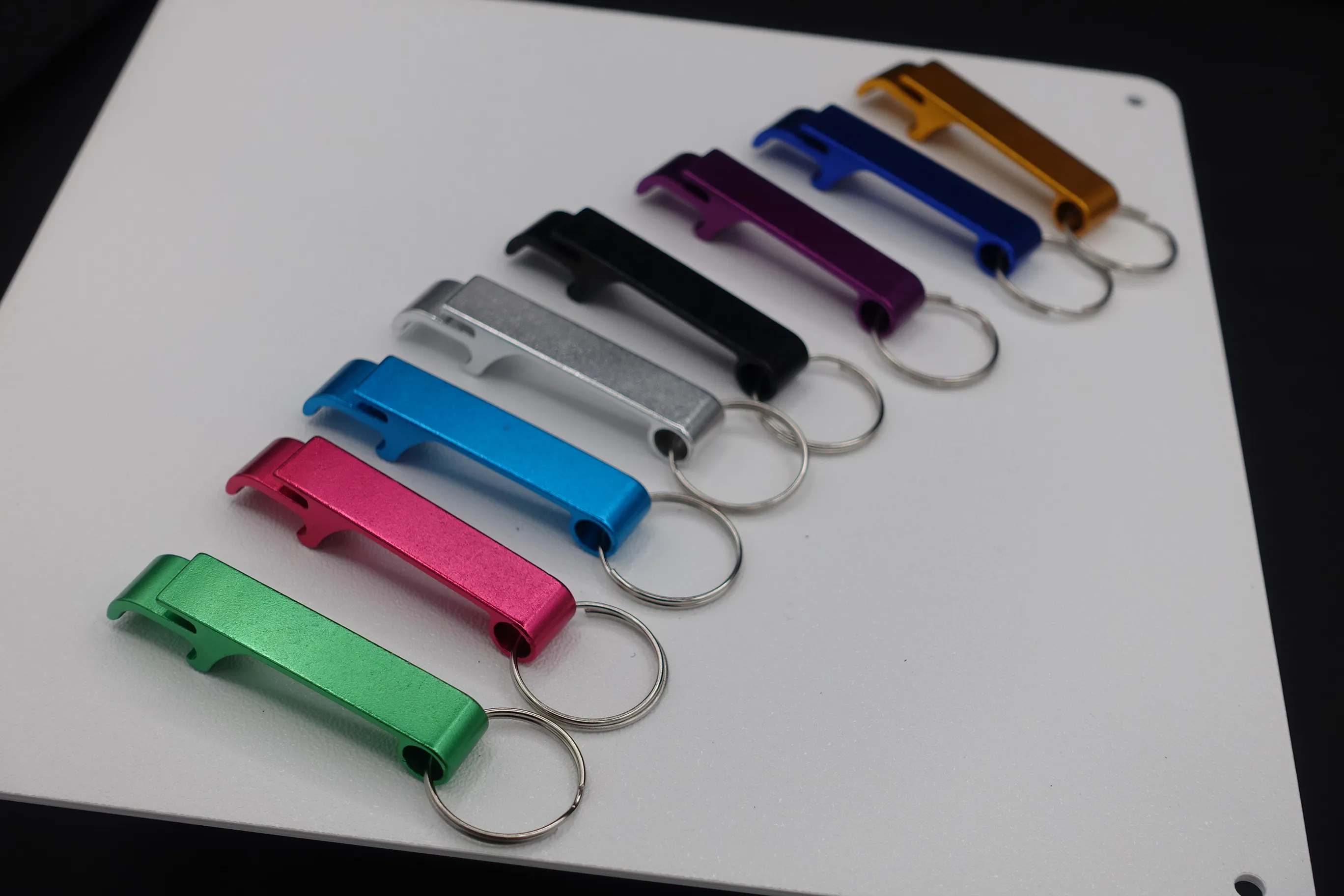 custom laser engraved bottle opener keychain made in Byron Center Michigan | StrazX